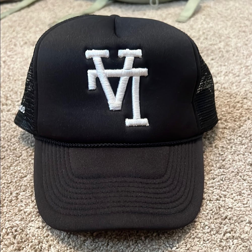 NGO Studios Black Trucker Hat white LA Logo
